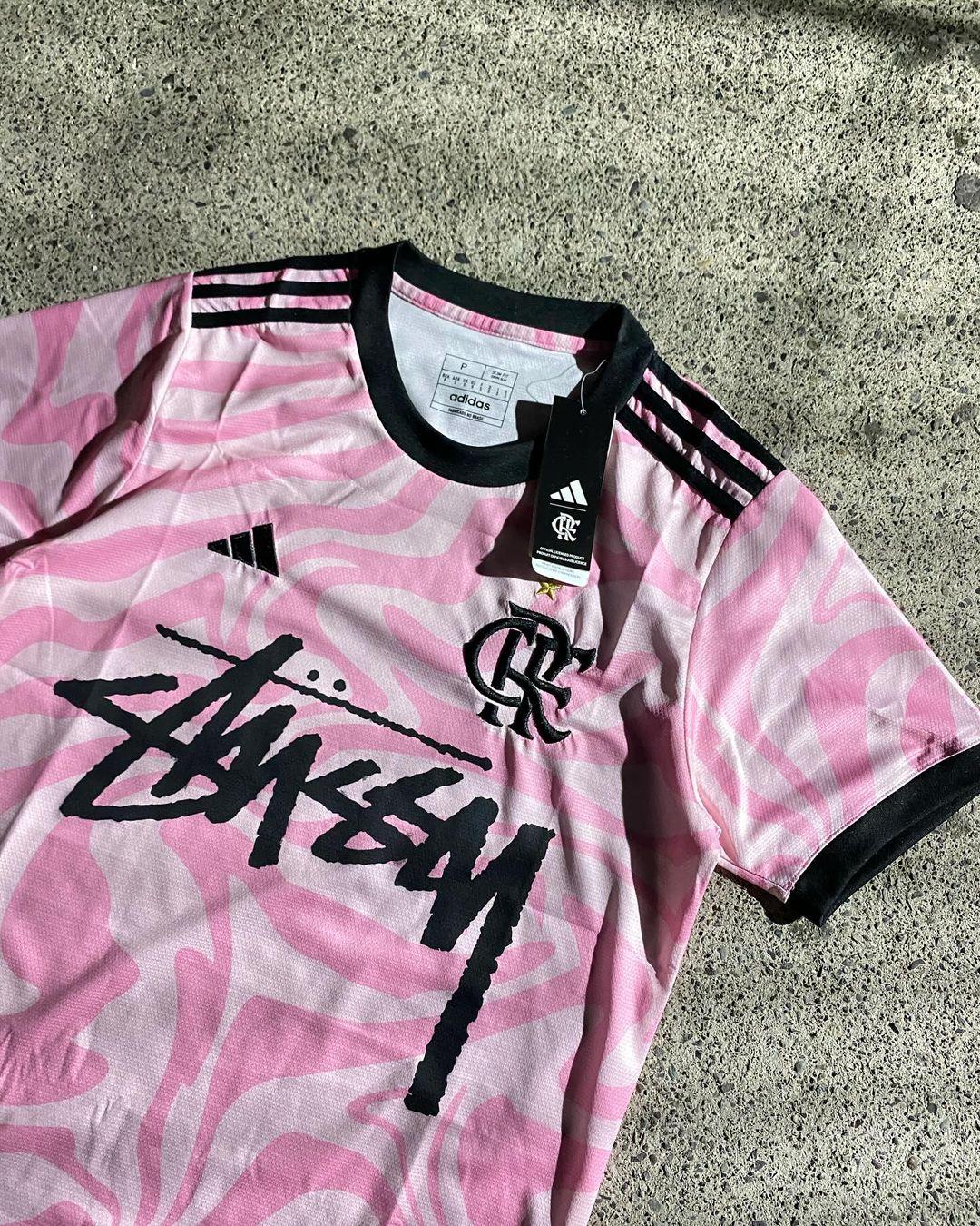 Stussy Flamengo Edition Jersey featuring Flamengo’s iconic red and black colors, combined with Stussy’s streetwear branding for a unique, limited-edition design.